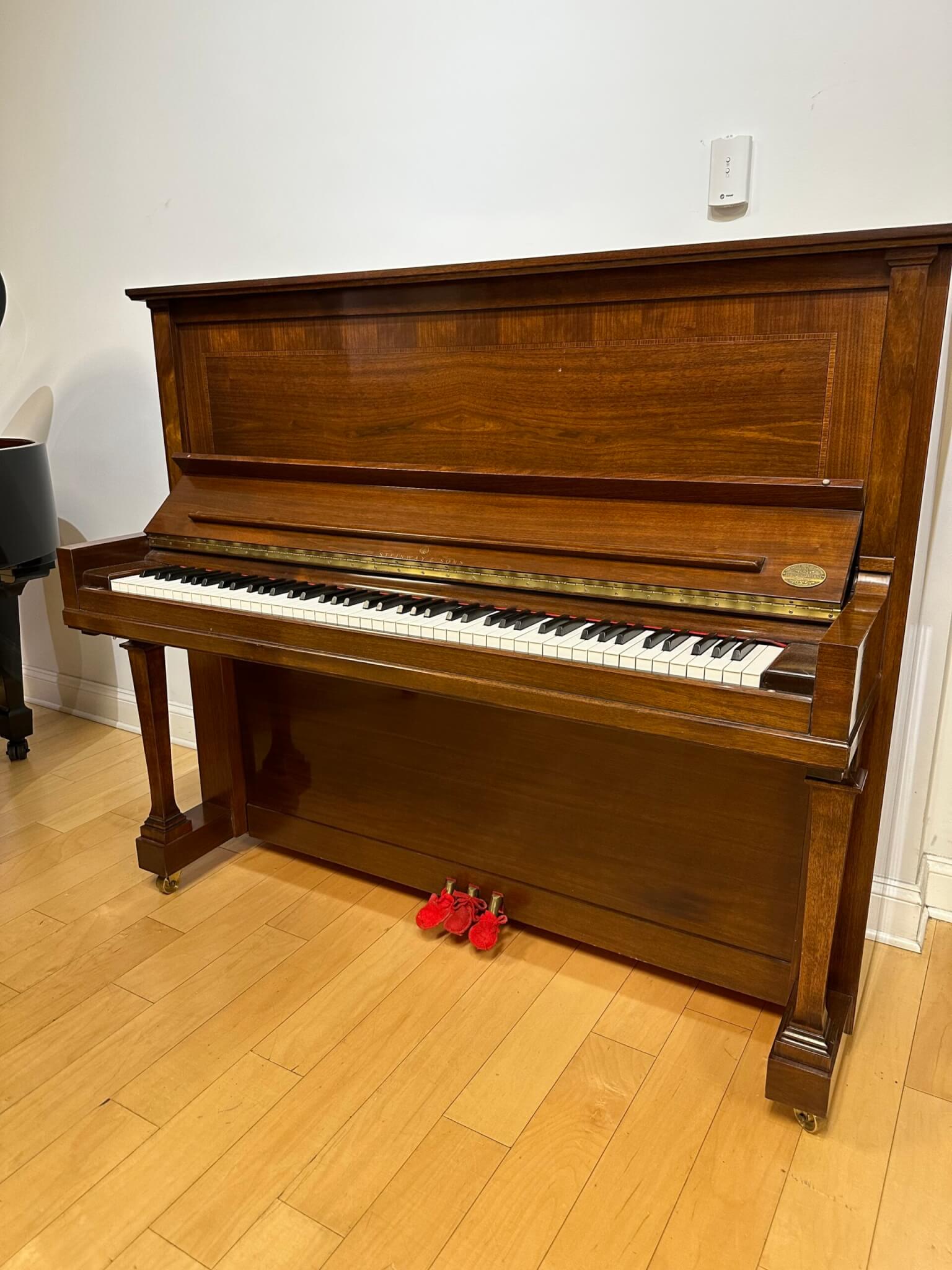 Steinway and sons upright piano price discount